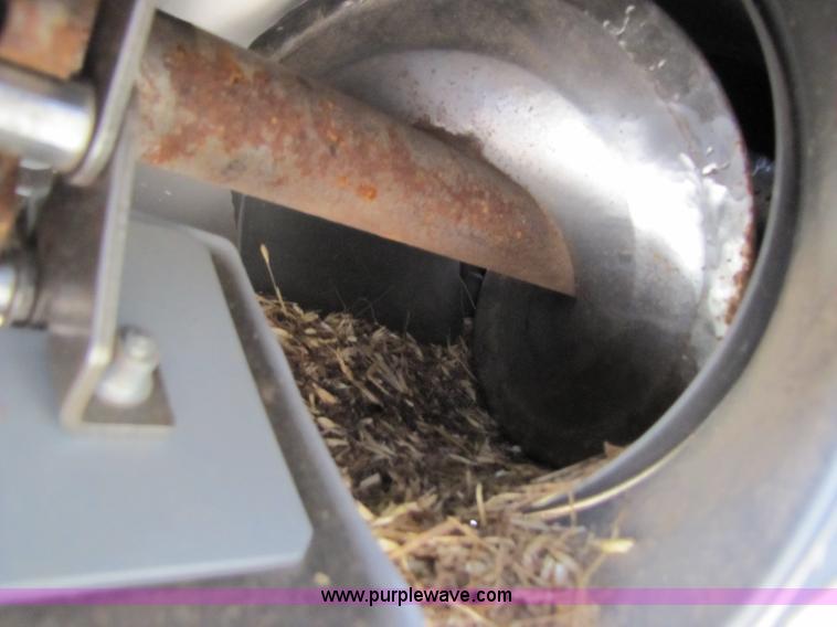 image for item B2209 1998 Caterpillar 480 Lexion combine