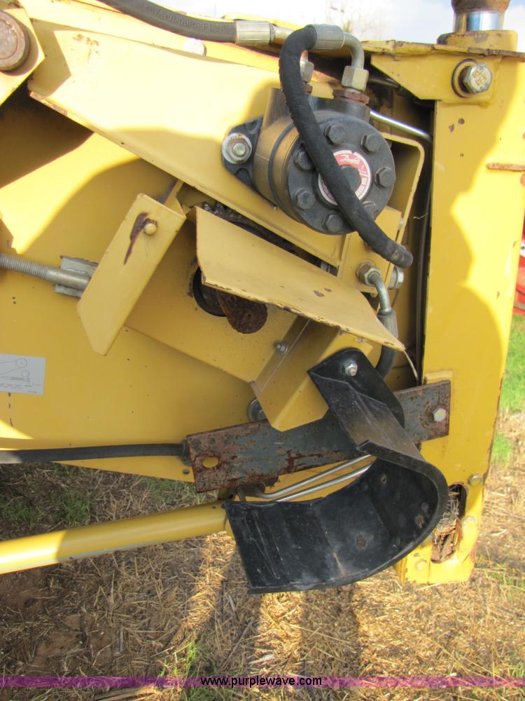 image for item B2209 1998 Caterpillar 480 Lexion combine