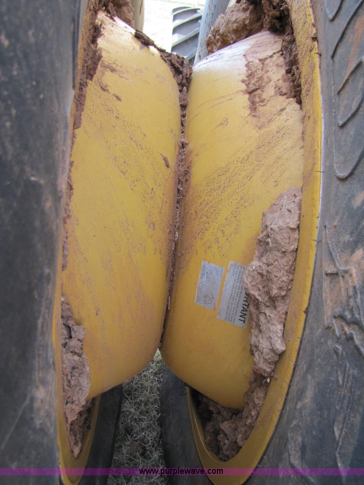 image for item B2209 1998 Caterpillar 480 Lexion combine