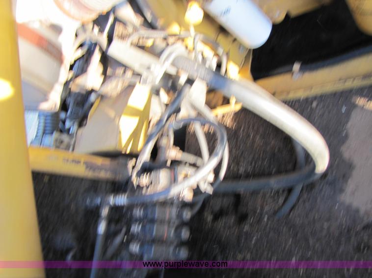 image for item B2209 1998 Caterpillar 480 Lexion combine