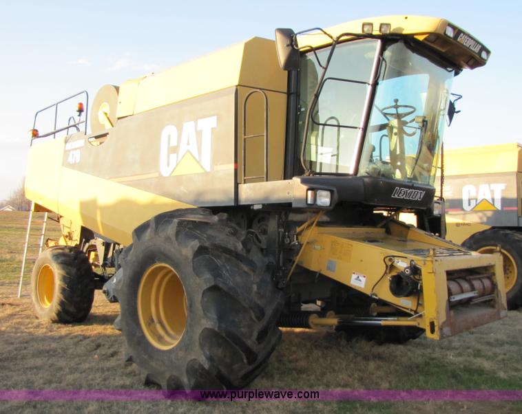 image for item B2210 2000 Caterpillar 470 Lexion RWA combine
