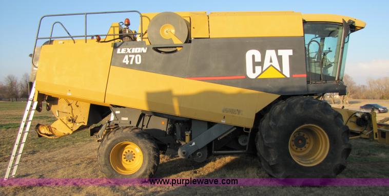 image for item B2210 2000 Caterpillar 470 Lexion RWA combine
