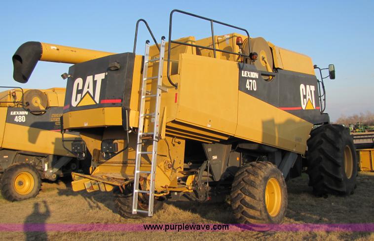 image for item B2210 2000 Caterpillar 470 Lexion RWA combine