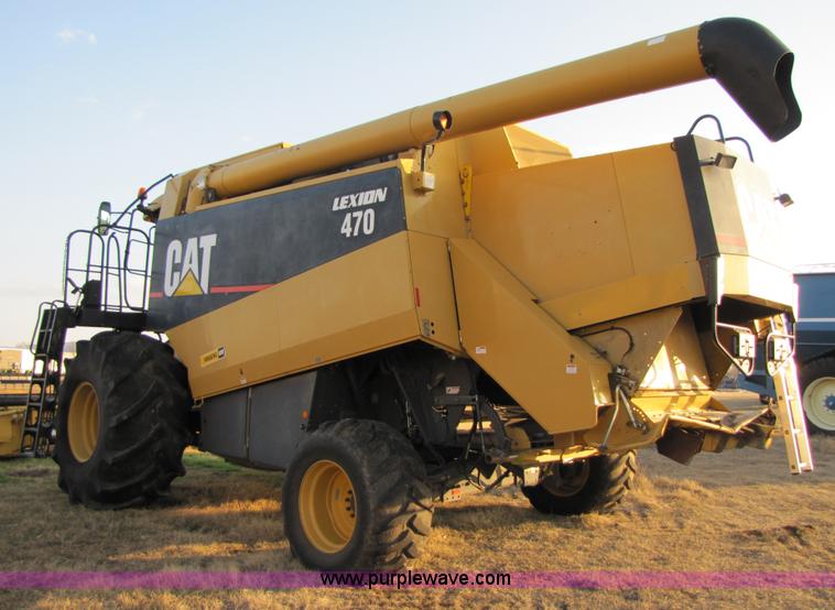 image for item B2210 2000 Caterpillar 470 Lexion RWA combine
