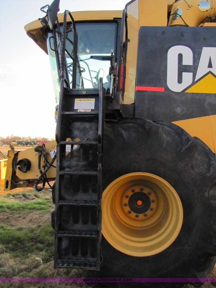 image for item B2210 2000 Caterpillar 470 Lexion RWA combine