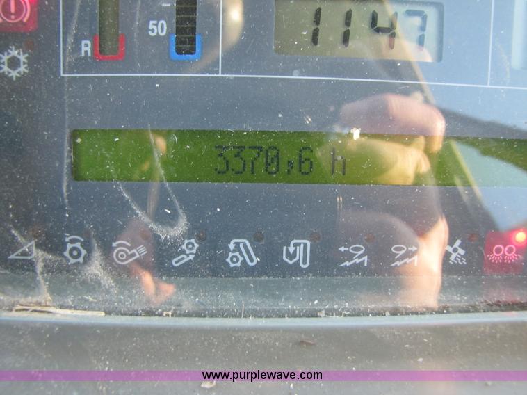 image for item B2210 2000 Caterpillar 470 Lexion RWA combine