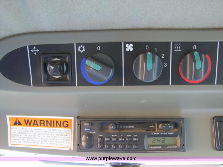 image for item B2210 2000 Caterpillar 470 Lexion RWA combine