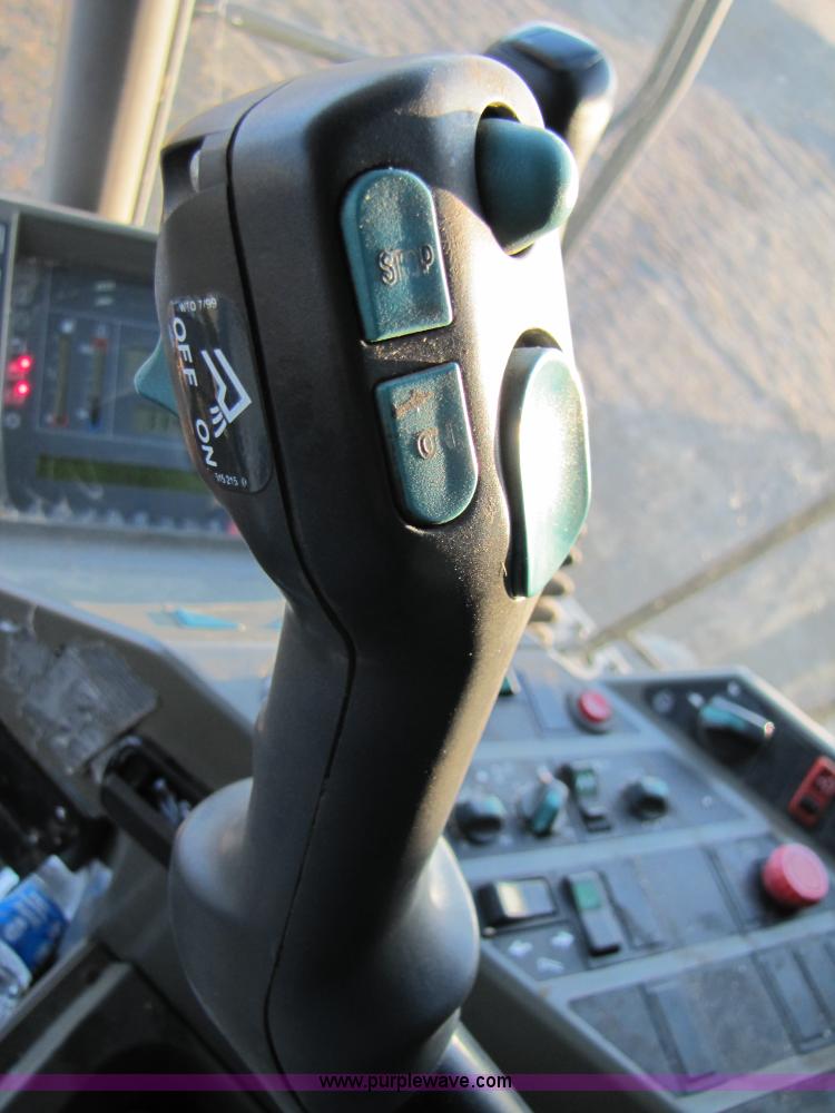 image for item B2210 2000 Caterpillar 470 Lexion RWA combine