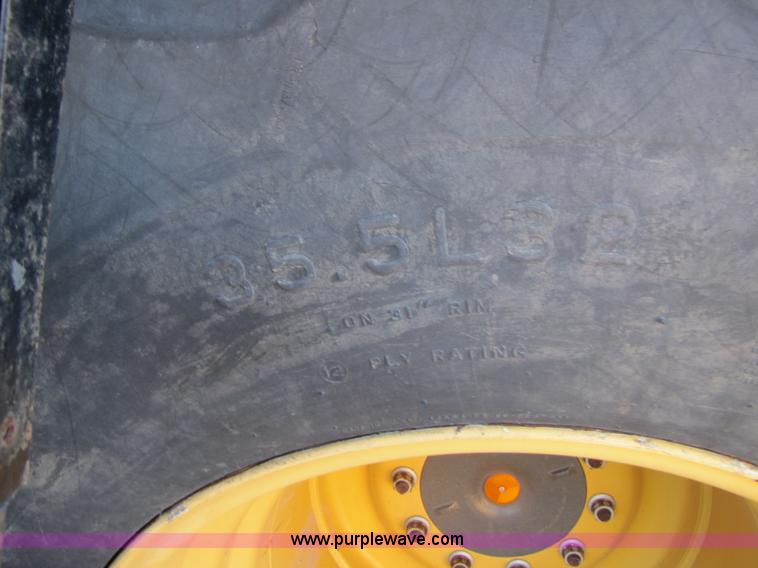 image for item B2210 2000 Caterpillar 470 Lexion RWA combine