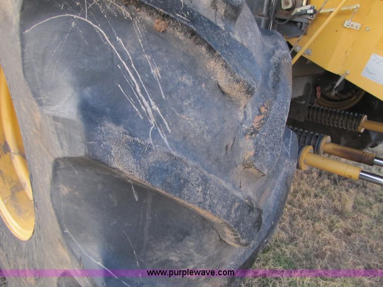 image for item B2210 2000 Caterpillar 470 Lexion RWA combine