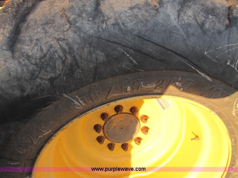 image for item B2210 2000 Caterpillar 470 Lexion RWA combine