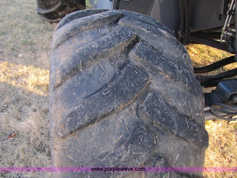 image for item B2210 2000 Caterpillar 470 Lexion RWA combine