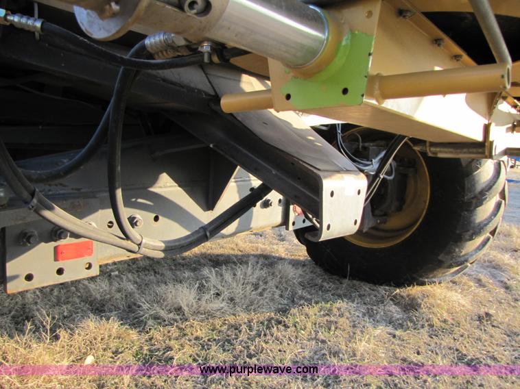 image for item B2210 2000 Caterpillar 470 Lexion RWA combine