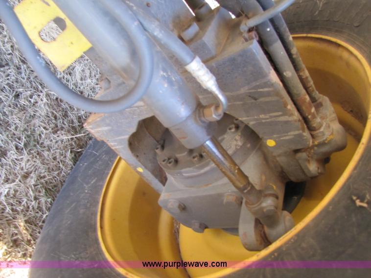 image for item B2210 2000 Caterpillar 470 Lexion RWA combine