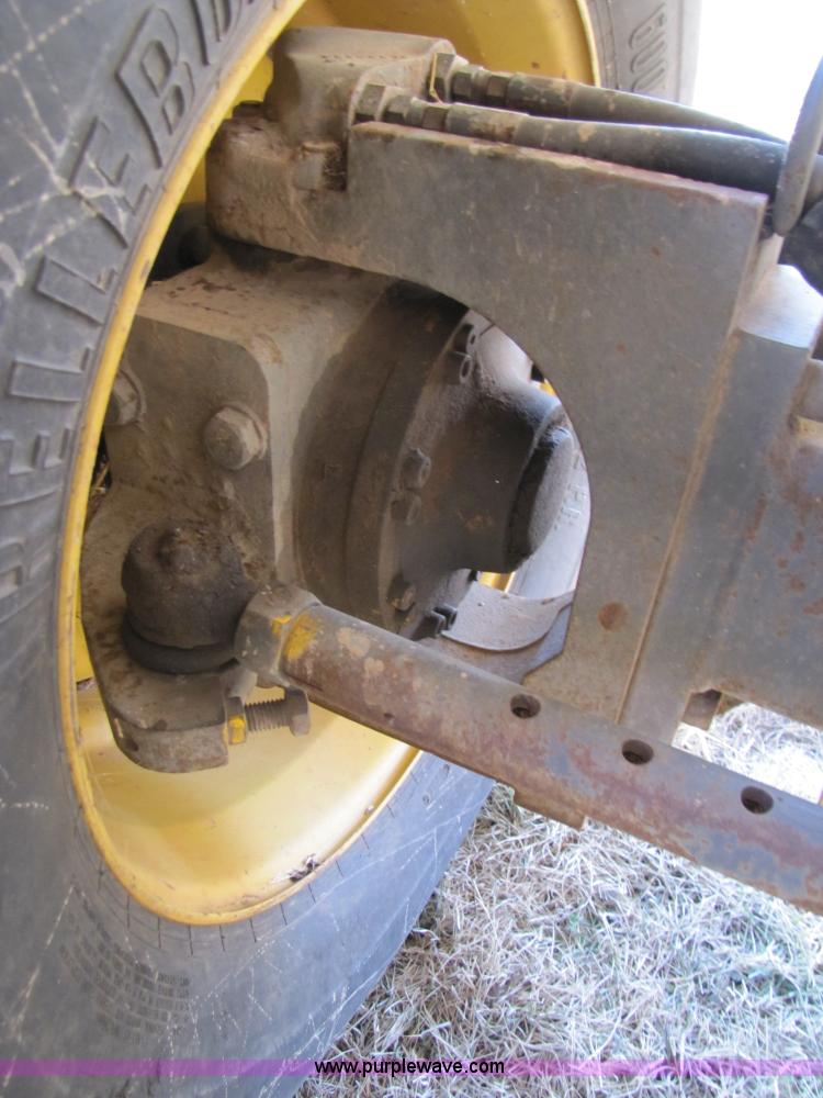 image for item B2210 2000 Caterpillar 470 Lexion RWA combine