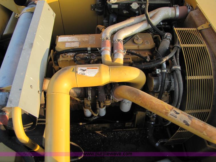 image for item B2210 2000 Caterpillar 470 Lexion RWA combine