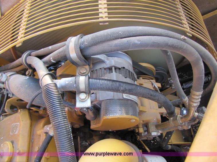 image for item B2210 2000 Caterpillar 470 Lexion RWA combine