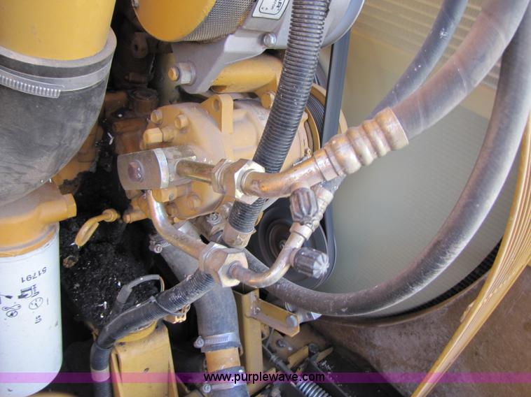 image for item B2210 2000 Caterpillar 470 Lexion RWA combine