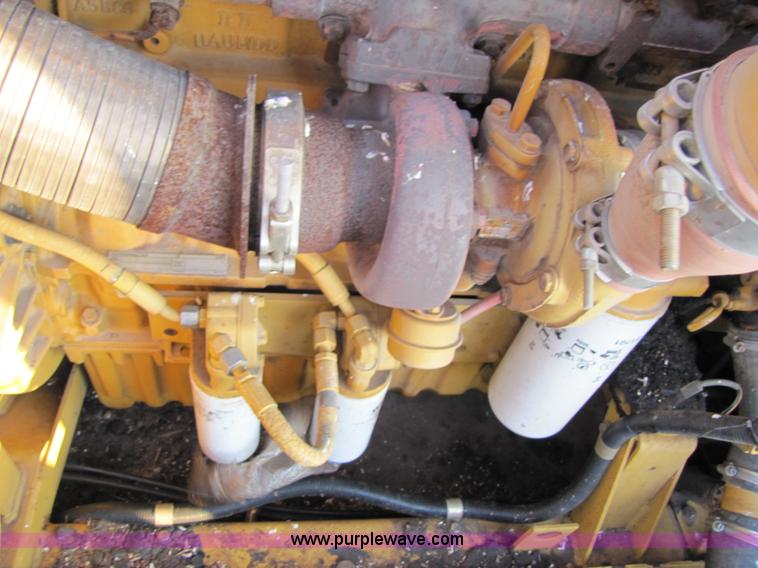 image for item B2210 2000 Caterpillar 470 Lexion RWA combine