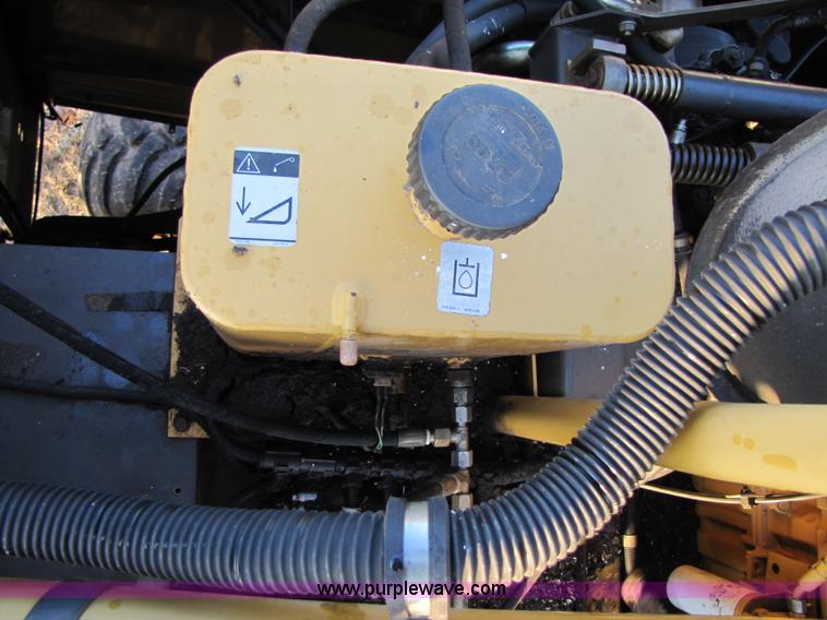 image for item B2210 2000 Caterpillar 470 Lexion RWA combine