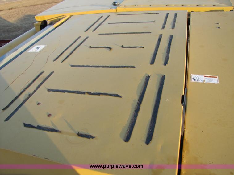 image for item B2210 2000 Caterpillar 470 Lexion RWA combine