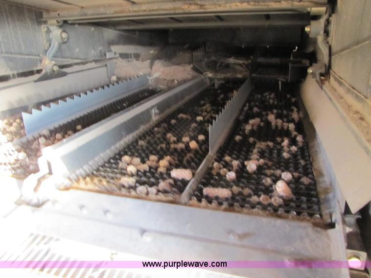 image for item B2210 2000 Caterpillar 470 Lexion RWA combine