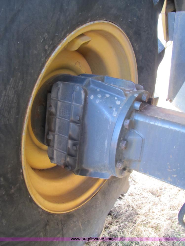 image for item B2210 2000 Caterpillar 470 Lexion RWA combine