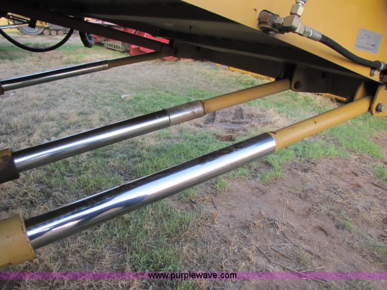 image for item B2210 2000 Caterpillar 470 Lexion RWA combine