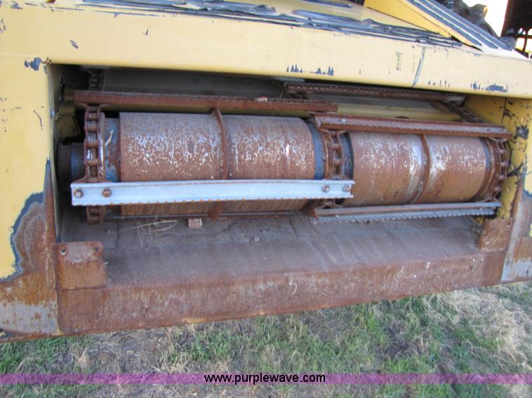 image for item B2210 2000 Caterpillar 470 Lexion RWA combine