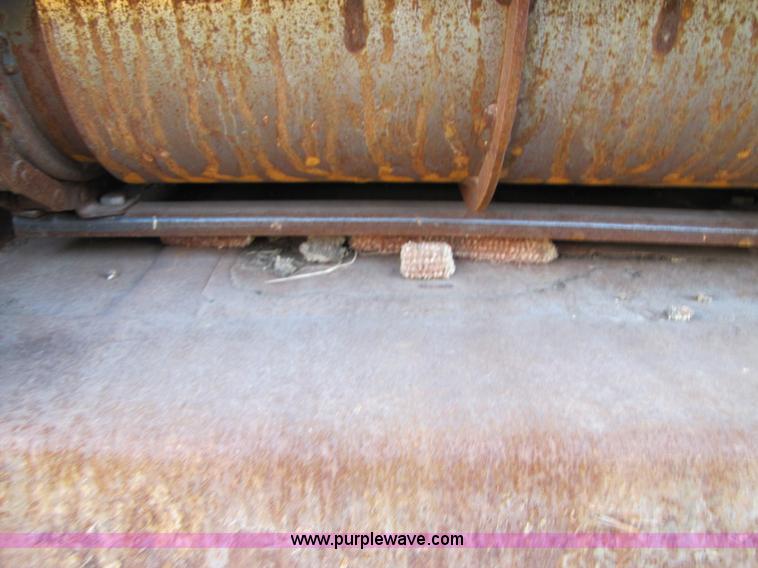 image for item B2210 2000 Caterpillar 470 Lexion RWA combine