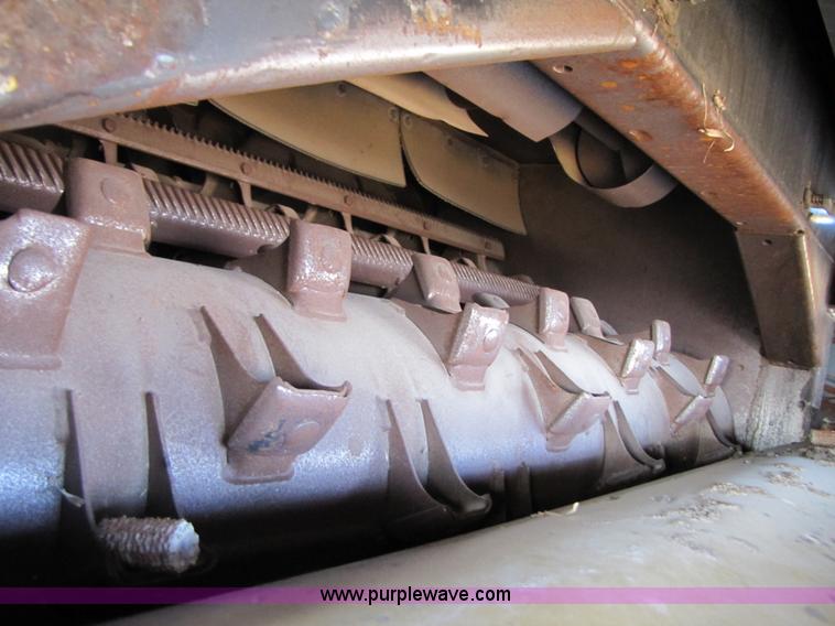 image for item B2210 2000 Caterpillar 470 Lexion RWA combine