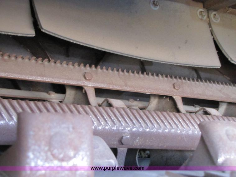 image for item B2210 2000 Caterpillar 470 Lexion RWA combine