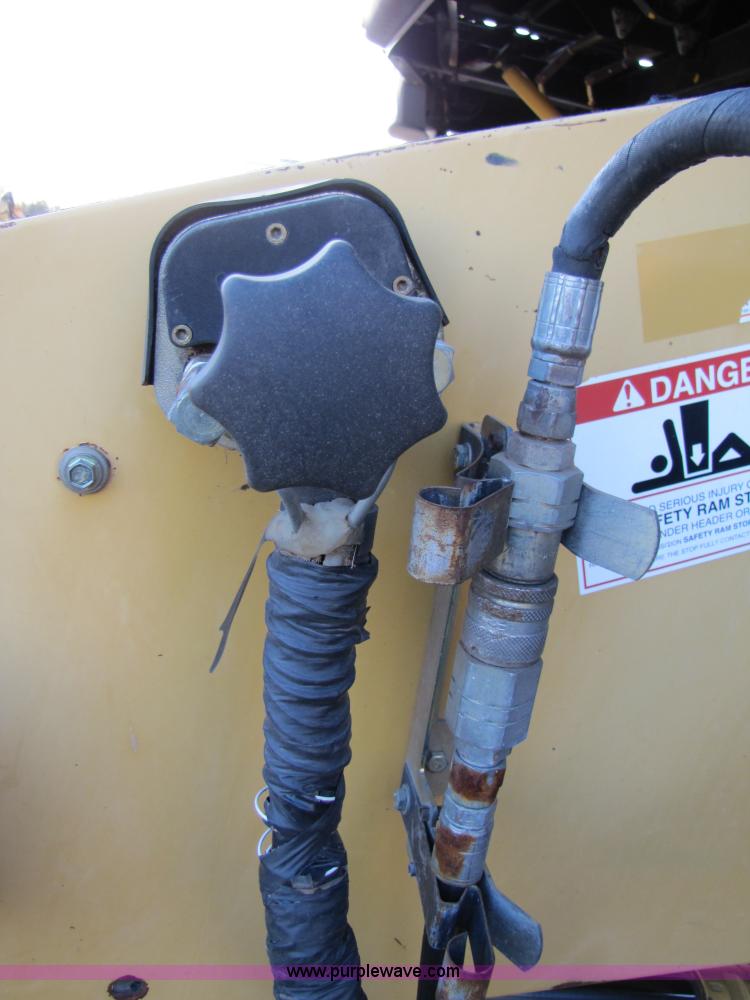 image for item B2210 2000 Caterpillar 470 Lexion RWA combine