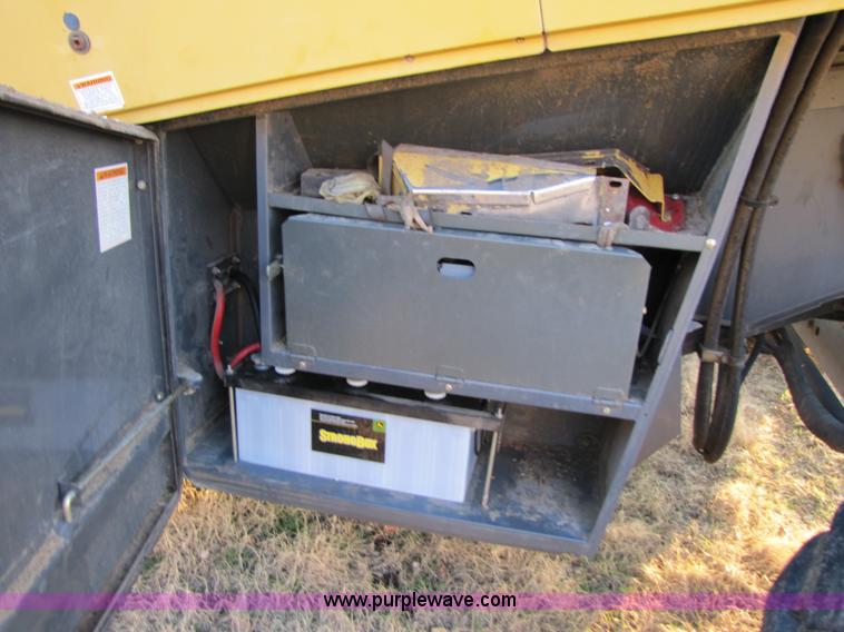 image for item B2210 2000 Caterpillar 470 Lexion RWA combine