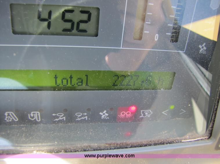 image for item B2210 2000 Caterpillar 470 Lexion RWA combine