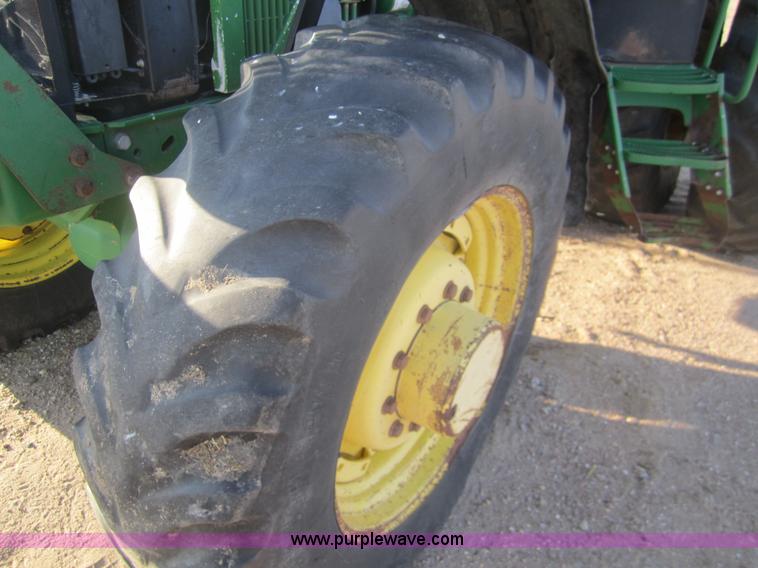 image for item B5671 1998 John Deere 7810 MFWD tractor