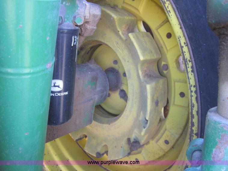 image for item B5671 1998 John Deere 7810 MFWD tractor