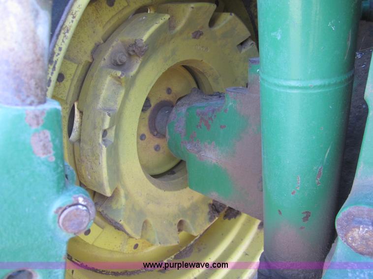 image for item B5671 1998 John Deere 7810 MFWD tractor