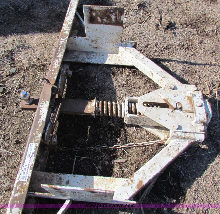 Adjustable spring loaded hitch in Lyons, KS Item I9629 sold Purple Wave