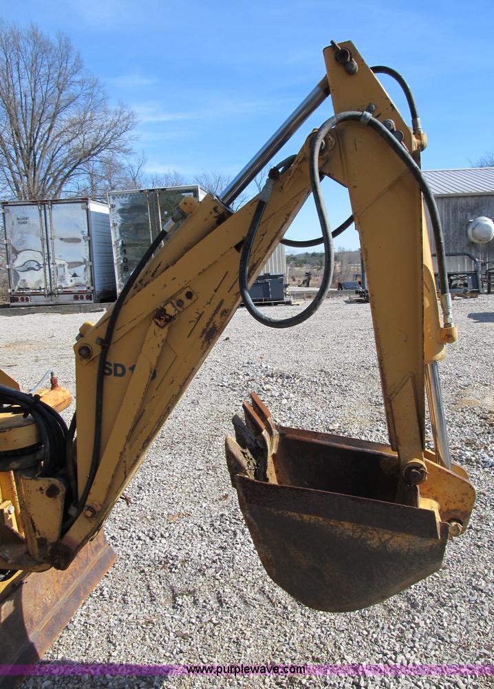 image for item B2604 Case 360 trencher backhoe