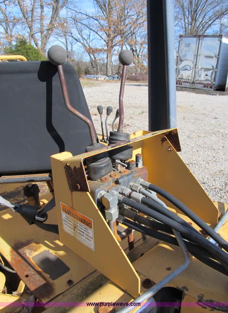 image for item B2604 Case 360 trencher backhoe