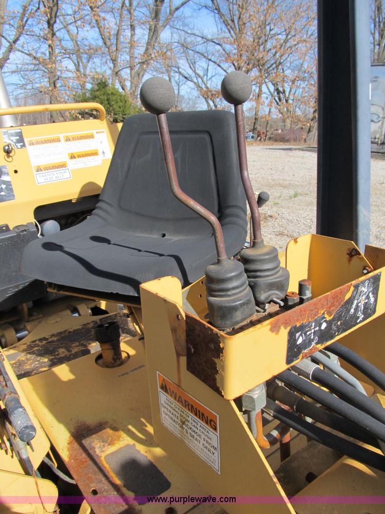 image for item B2604 Case 360 trencher backhoe