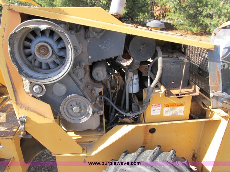 image for item B2604 Case 360 trencher backhoe