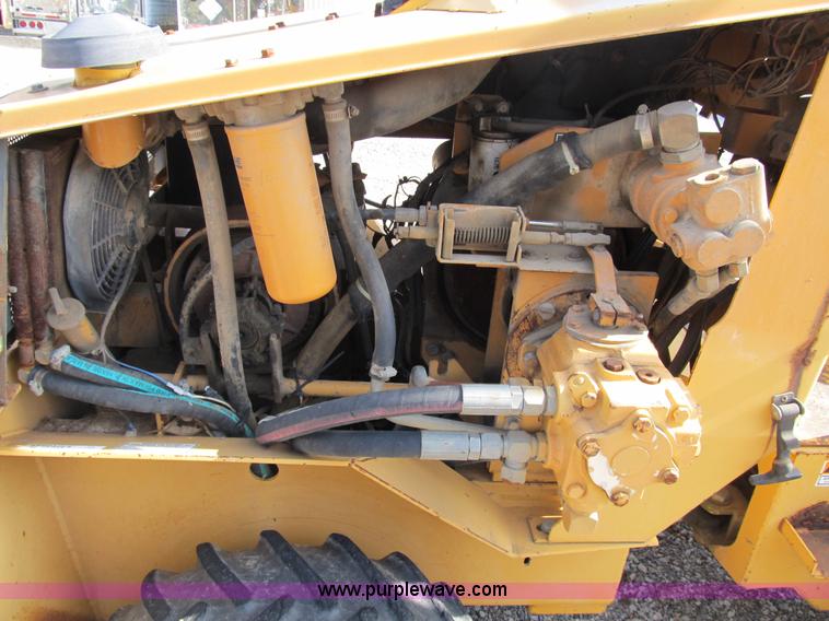 image for item B2604 Case 360 trencher backhoe