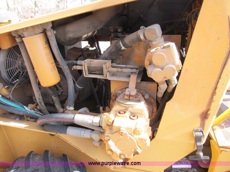 image for item B2604 Case 360 trencher backhoe