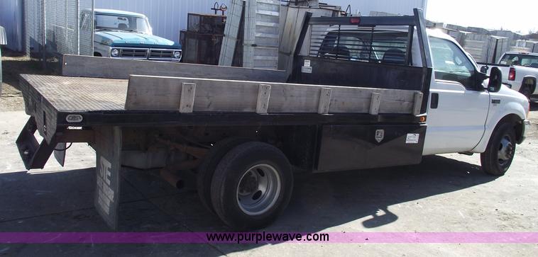image for item B6138 2000 Ford F350 XL Super Duty flatbed pickup truck