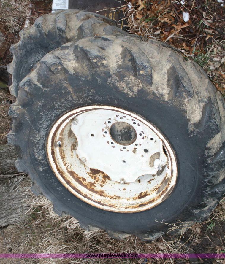 image for item H9621 (2) 14.9-24 tires and wheels