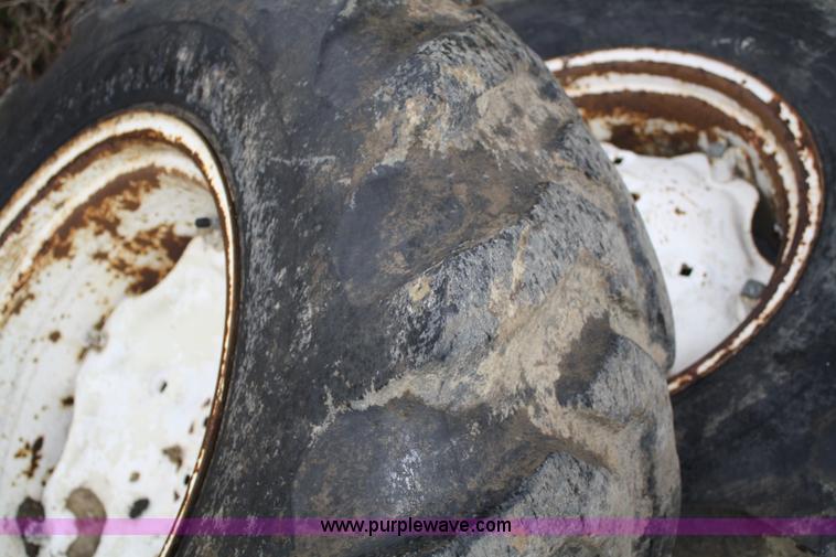 image for item H9621 (2) 14.9-24 tires and wheels