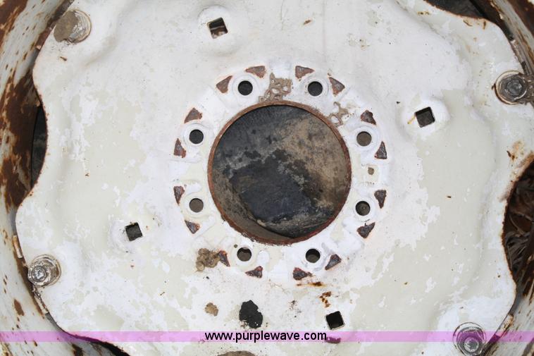 image for item H9621 (2) 14.9-24 tires and wheels