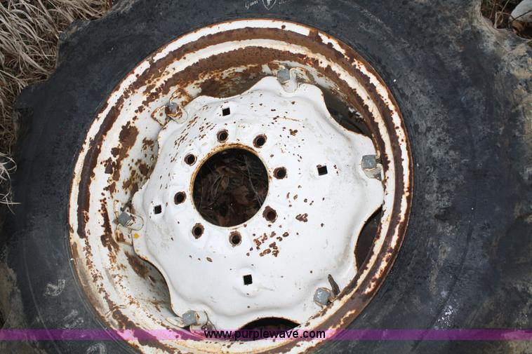 image for item H9621 (2) 14.9-24 tires and wheels